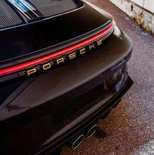 Load image into Gallery viewer, Porsche Emblems - 24K Gold or Brushed Nickel or Gloss Nickel or Plastic
